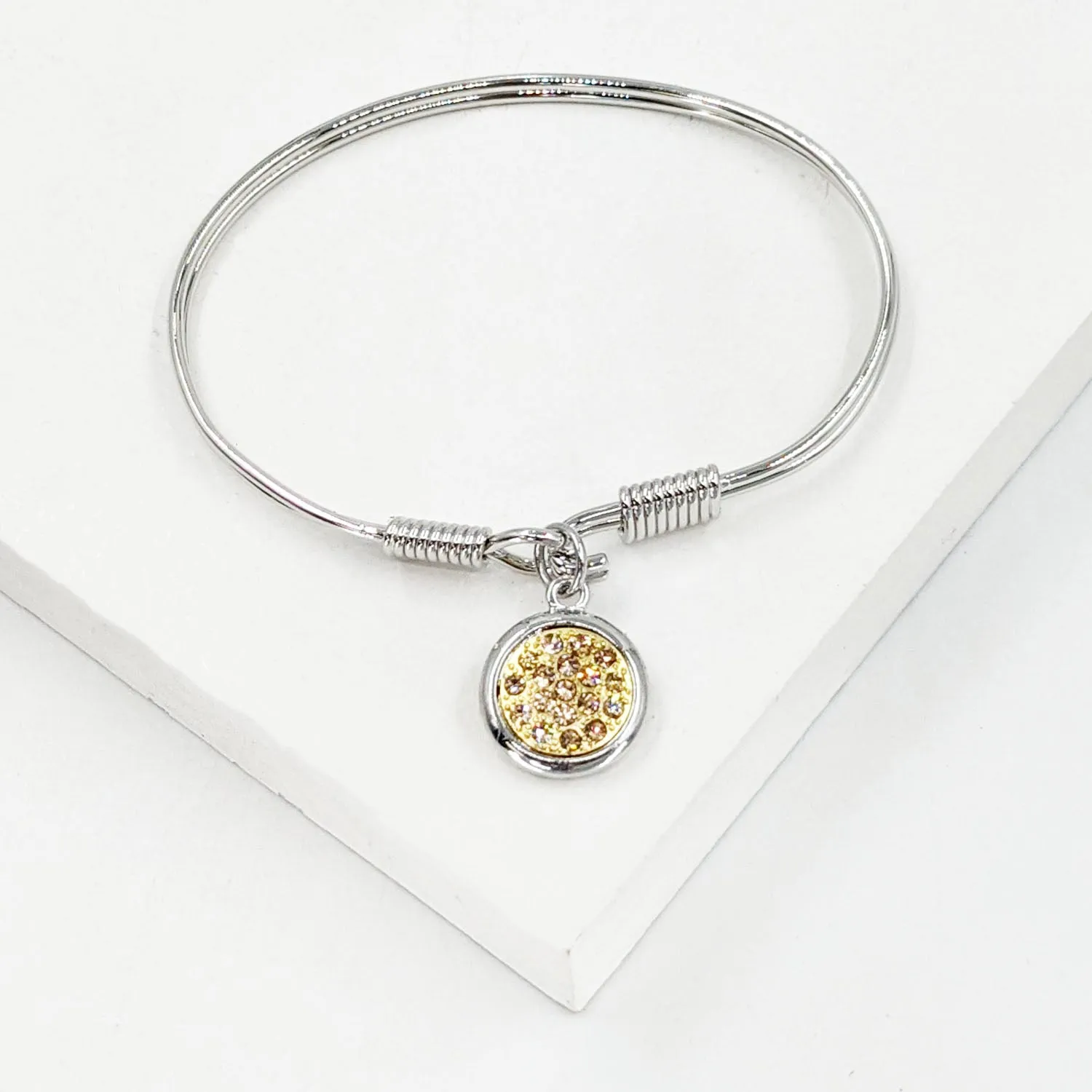 Delicate bangle with mosaic style disc charm