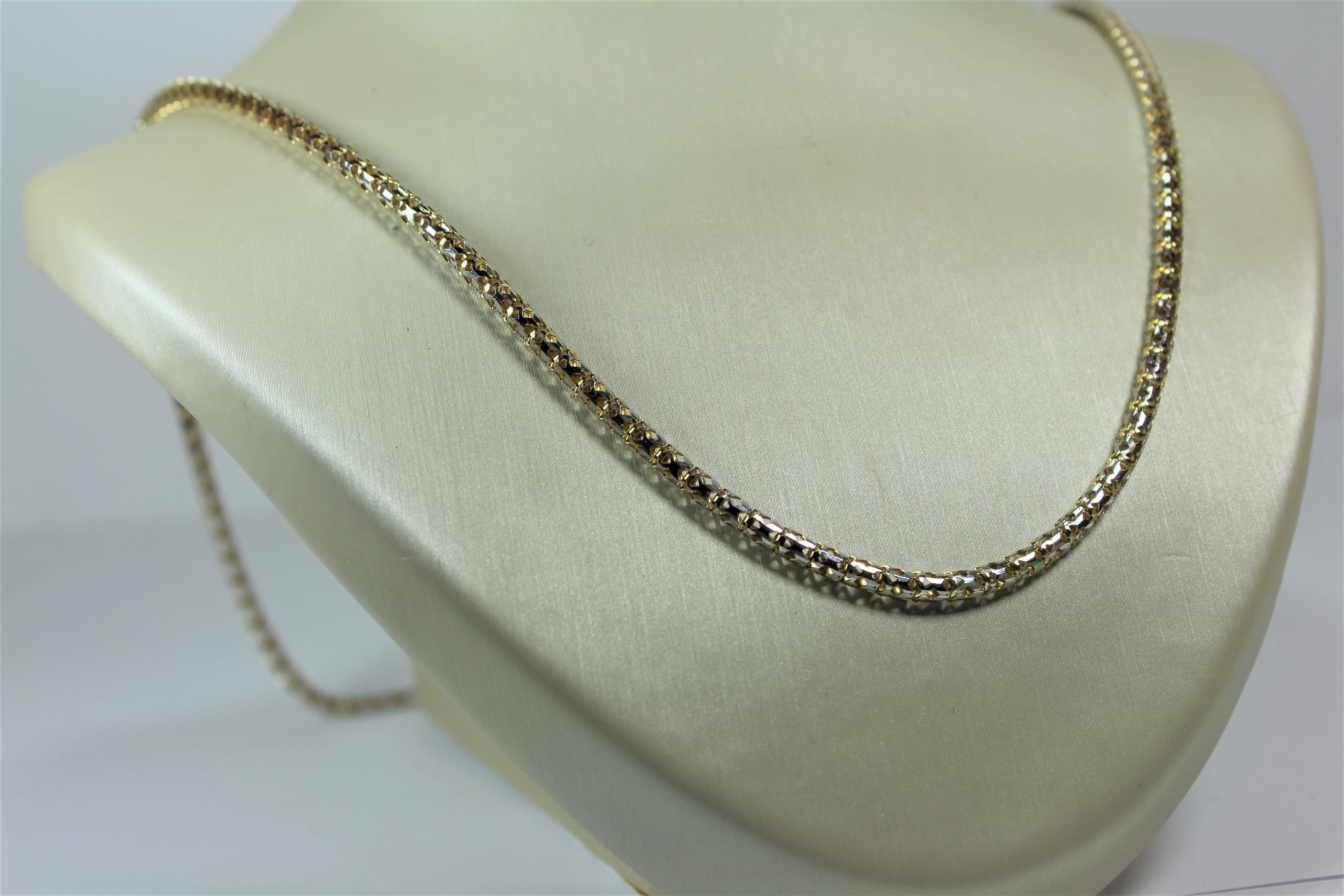 Hollowed 10k 2 tone box chain with design cuts. 3.1mm wide 26”
